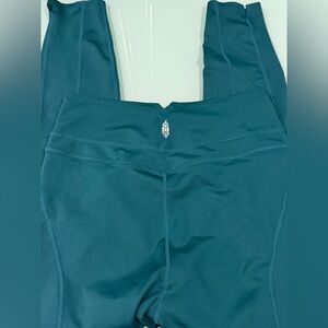 green athletic leggings are a Free People Movement